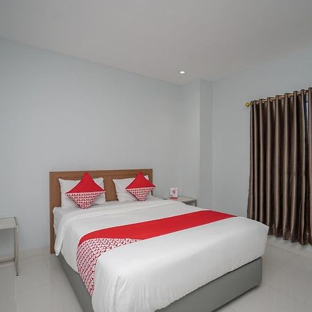 Oyo 616 Express Inn Palembang Extérieur photo
