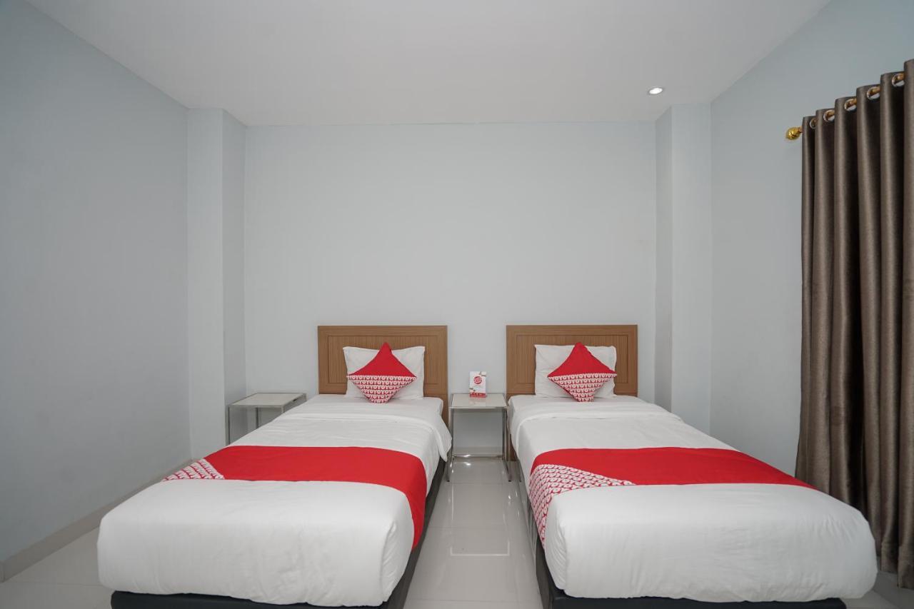 Oyo 616 Express Inn Palembang Extérieur photo